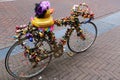 One of the many iconic bicycles of Amsterdam decorated with ornaments of a thousand colors