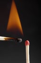 One match is burning another. Royalty Free Stock Photo