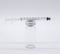 One medical Vaccine ampules one syringe on a white background Royalty Free Stock Photo