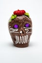 One Mexican Calaverita de azucar Candy Skull and Calaverita de Chocolate Full front