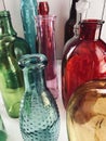 one in a million, standing out in a crowd, assorted colorful bottles, Rainbow Royalty Free Stock Photo