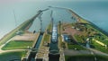 [One Minute Video] Enclosure Dam (Afsluitdijk): Large Cargo Ship Entering Sluice - The Netherlands â 4K Drone