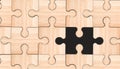 One Missing Piece of jigsaw puzzle. Wooden Textured pieces game Royalty Free Stock Photo