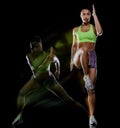 Woman exercising fitness exercises isolated black background lightpainting effect Royalty Free Stock Photo