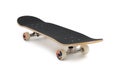 One modern skateboard with black griptape isolated on white Royalty Free Stock Photo
