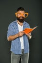 One more chapter. University male student reading lecture notes. Study nerd holding book. Book nerd wearing fancy
