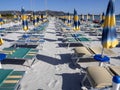 Morning empty beach with parasols, Sardinia, Italy Royalty Free Stock Photo