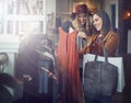 This one is a must-have. two best friends out shopping in a clothing store. Royalty Free Stock Photo