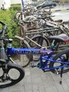 One new cycle and many abandoned bicycles together