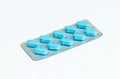 One new pack of 10 blue oblong pills isolated on a white background Royalty Free Stock Photo