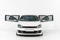 one new white car with open doors Royalty Free Stock Photo