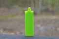 one old broken plastic green lighter Royalty Free Stock Photo