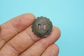 One old copper green button from horse harness Royalty Free Stock Photo