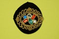 One old gold brooch hairpin with colored gemstones