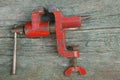 One old iron red vise clamp Royalty Free Stock Photo