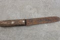 One old large iron knife in brown rust Royalty Free Stock Photo
