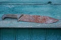 One old large machete knife with a brown rusty blade Royalty Free Stock Photo