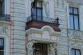 One old open brown balcony with black  wrought iron bars on the concrete wall Royalty Free Stock Photo