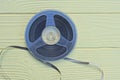 one old plastic black gray magnetic reel for a tape recorder Royalty Free Stock Photo