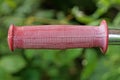 One old plastic red bicycle handle Royalty Free Stock Photo