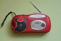 One old red mini mobile tape recorder with radio Royalty Free Stock Photo