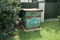 One old rusty closed metal trash can Royalty Free Stock Photo