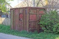One old square brown red rusty container with a window Royalty Free Stock Photo