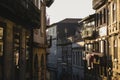 One of the old streets in the morning sunlight in downtown Porto, Portugal Royalty Free Stock Photo
