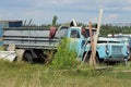 One old truck with a blue cabin Royalty Free Stock Photo