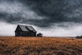 one old wooden abandoned house in a field, ranch, dark dramatic sky, autumn nature as background Royalty Free Stock Photo