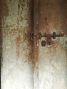 Old wooden door with latch. Royalty Free Stock Photo