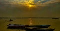 Pilgrims enjoying early sunrise boat ride on Ganga/Ganges river in Varanasi, India Royalty Free Stock Photo