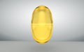 One omega capsules, top view.Omega 3 acid, yellow gelatin capsule 3d rendering illustration. Vitamin drop gold pill