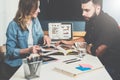 One on one meeting.Business meeting.On table is laptop and notebook with graphs and diagrams on screen. Online education Royalty Free Stock Photo