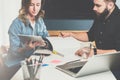 One on one meeting. Business meeting. Teamwork. Businessman and businesswoman sitting at table and working. Royalty Free Stock Photo