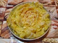 Open head of sauerkraut in aluminium plate