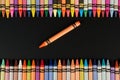 One orange color crayon Royalty Free Stock Photo