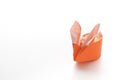 One Orange Origami Easter Bunny Basket Stuffed with Straw Royalty Free Stock Photo