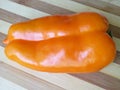 One orange pepper close up