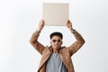 One out of ten. Eww. Portrait of young attractive dark-skinned man with afro hairstyle in casual clothes and sunglasses Royalty Free Stock Photo