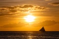 One outrigger sailboat on the horizon Royalty Free Stock Photo