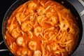Shrimp and Pasta in Tomato Cream Sauce in a Saute Pan Royalty Free Stock Photo