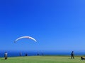 One paraglider pilot has just jump and is flying, Lima