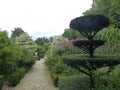 Castillon garden with bushes like sculptures in Normandy in France.