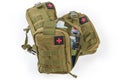 One partly open and closed military individual first aid kits