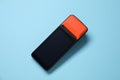 One payment terminal on light blue background, top view Royalty Free Stock Photo