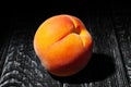 one peach on wood Royalty Free Stock Photo