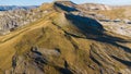 One of the peaks of Visocica mountain near Sarajevo during golden hour. Autumn aerial landscape. Royalty Free Stock Photo