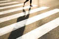 One pedestrian crossing the street Royalty Free Stock Photo