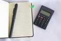 One pencil, notebook and a calculator